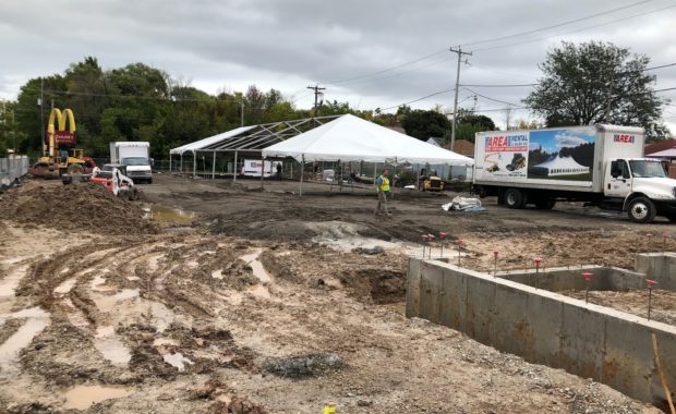 Tent used to help construction during rain